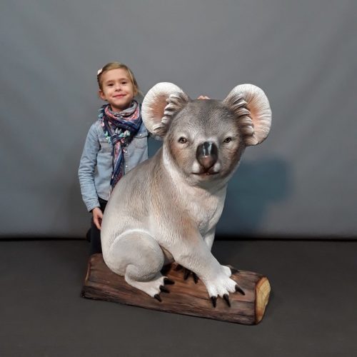 Koala sur tronc de bois décor exotique nlcdeco