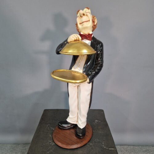 figurine serveur avec cloche