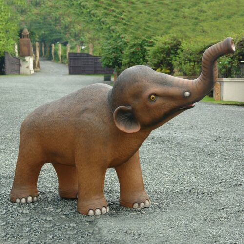 Statue bébé éléphant en résine trompe en l'air nlcdeco